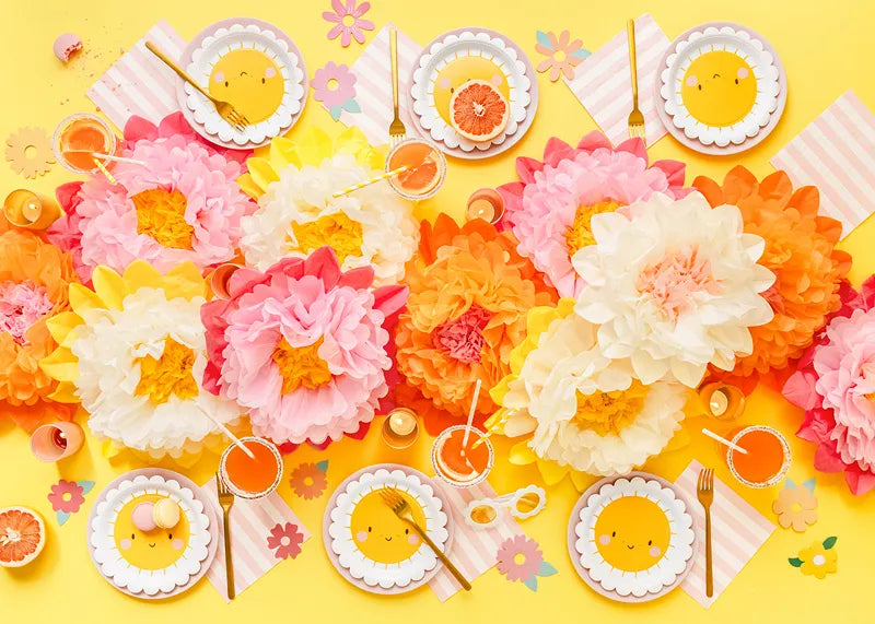 floral table decor with sun paper plates