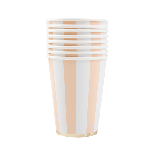 Set of striped paper cups with peach and white pattern on a white background