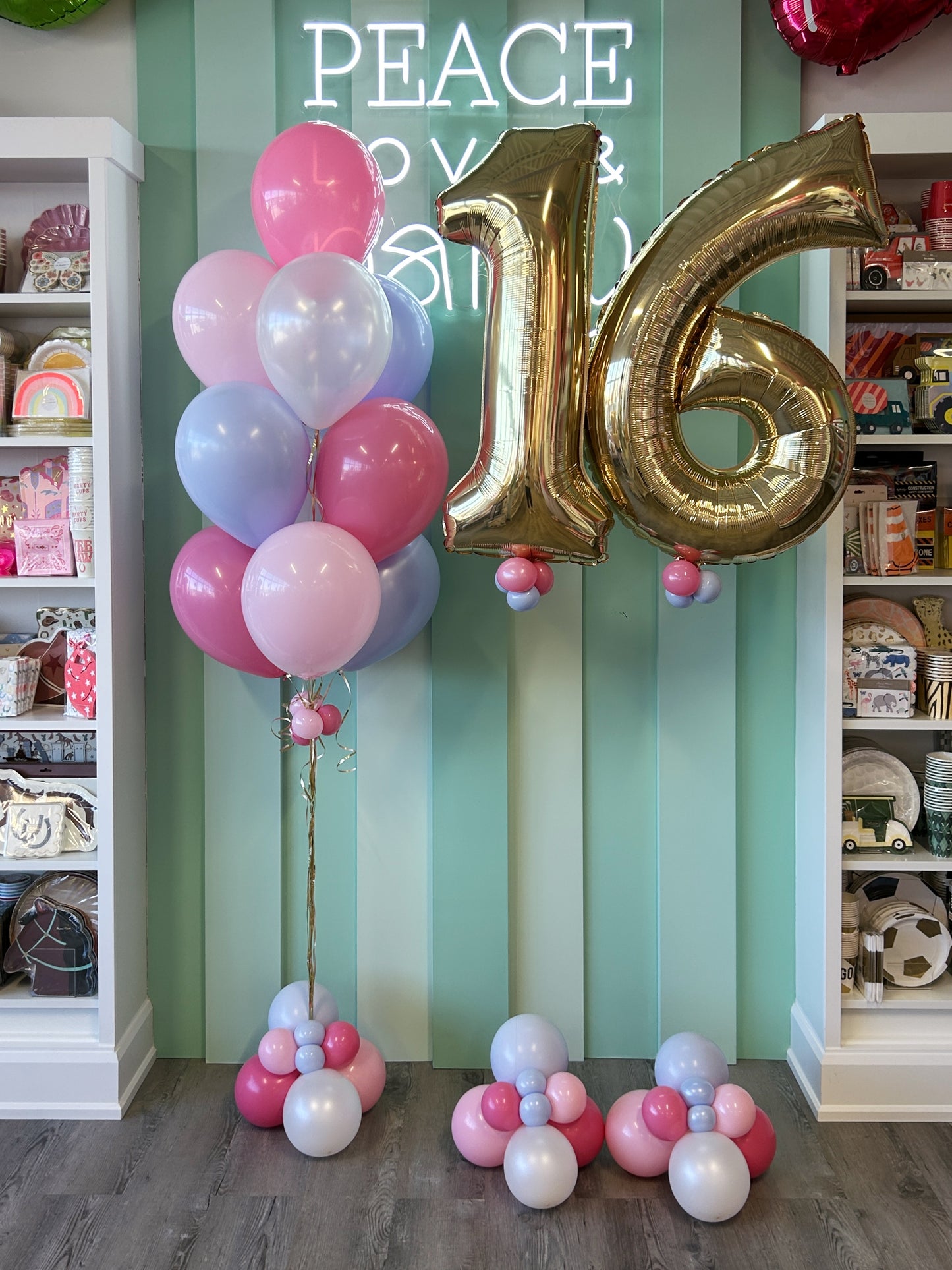 Sweet Sixteen balloon set with gold foil number balloons and pastel balloon bouquet, styled for a birthday celebration and sold in Toronto at Confetti My Party.