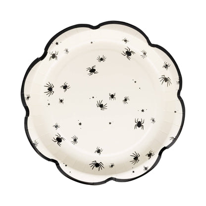White scalloped plate with scattered black spiders, available at our Toronto party shop.