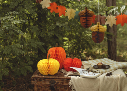 Tissue paper pumpkins in yellow and orange displayed as cozy fall party décor, shipping across Canada.