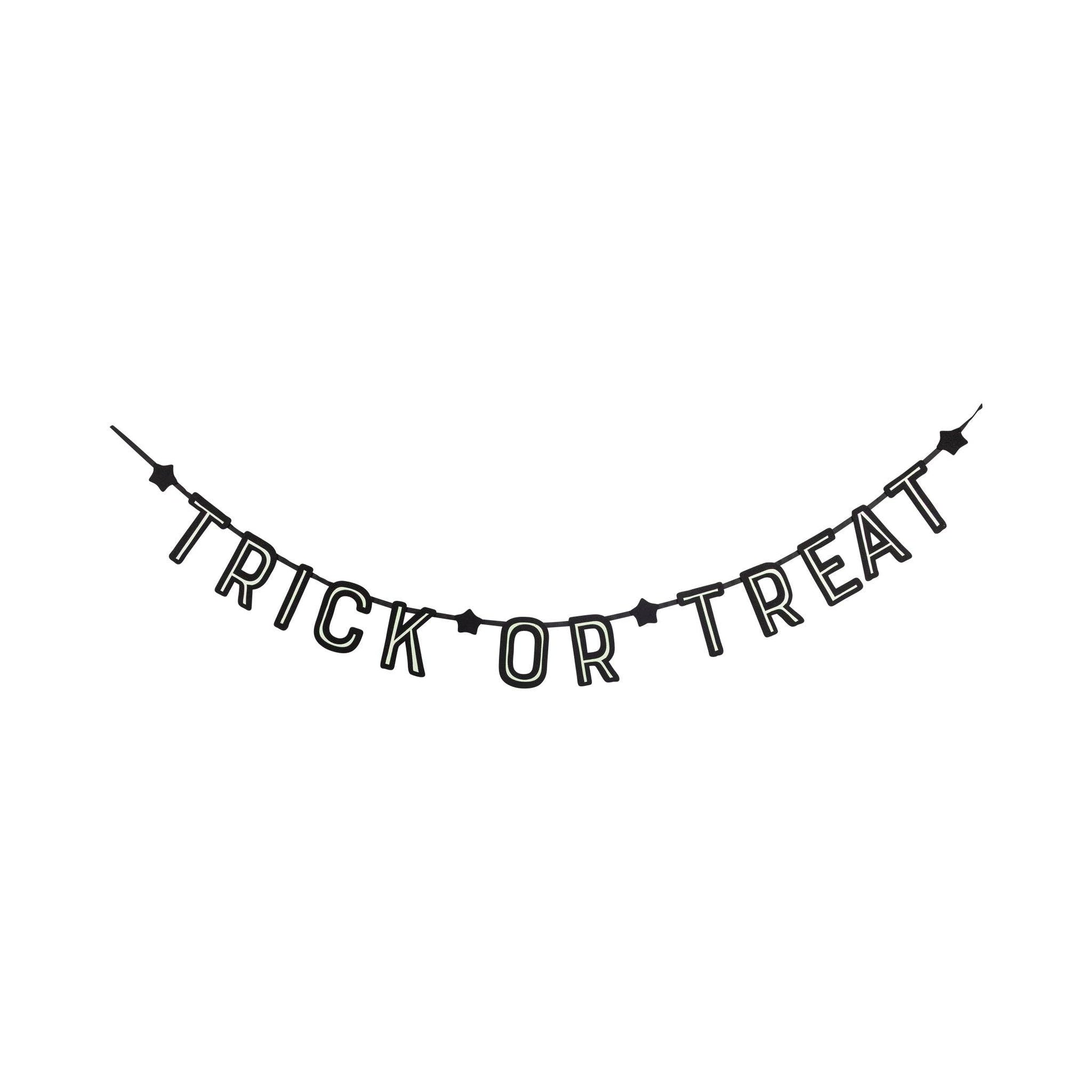 glow in the dark Black 'Trick or Treat' banner on a white background