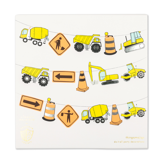 Under construction banner packaging featuring construction vehicles and road signs for kids party decor from Confetti My Party Toronto