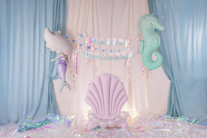 seahorse and mermaid foil balloon set up with matching under the sea party supplies sold in Toronto at Confetti My Party. 