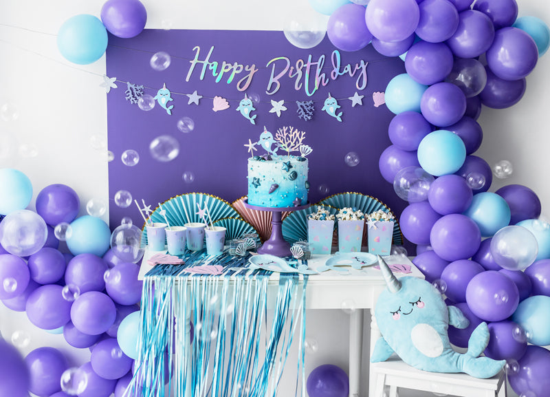 blue and purple themed party set up for underwater theme celebration