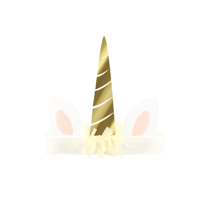 Gold unicorn horn with pink ears on a white background