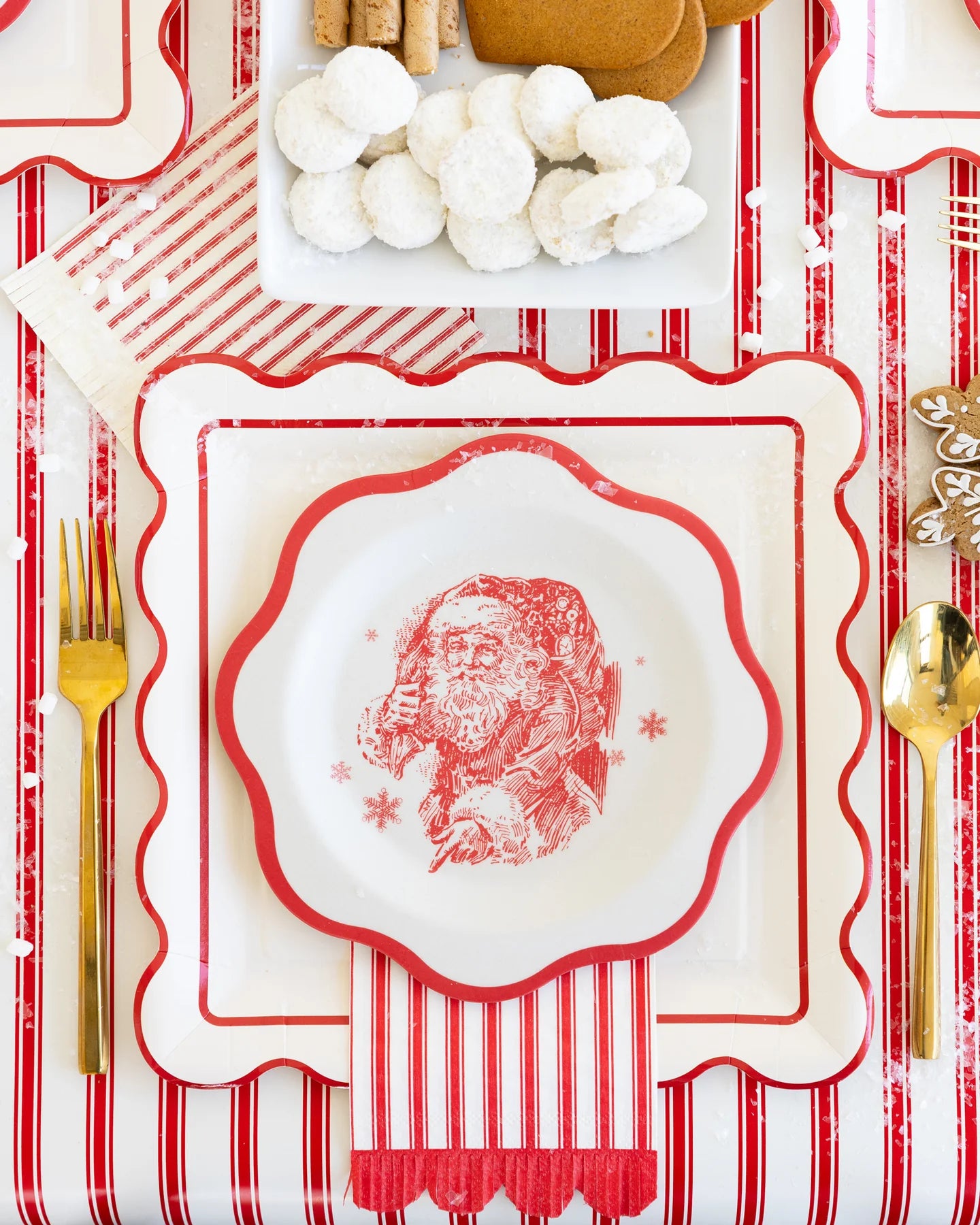 Vintage red and white bamboo plates styled on striped holiday table with cookies, Confetti My Party Toronto.