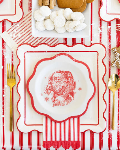 Vintage red and white bamboo plates styled on striped holiday table with cookies, Confetti My Party Toronto.