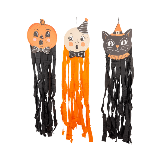 Three Halloween-themed decorations: a pumpkin, ghost, and cat with ribbons on a white background.