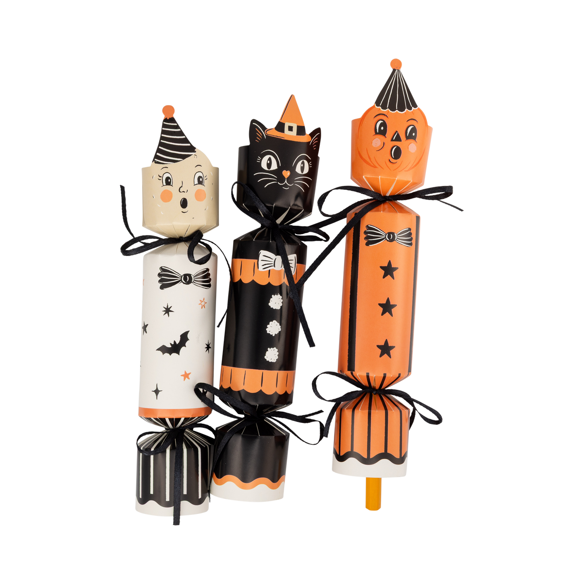 Three Halloween-themed crackers with cat, witch, and pencil designs on a white background.