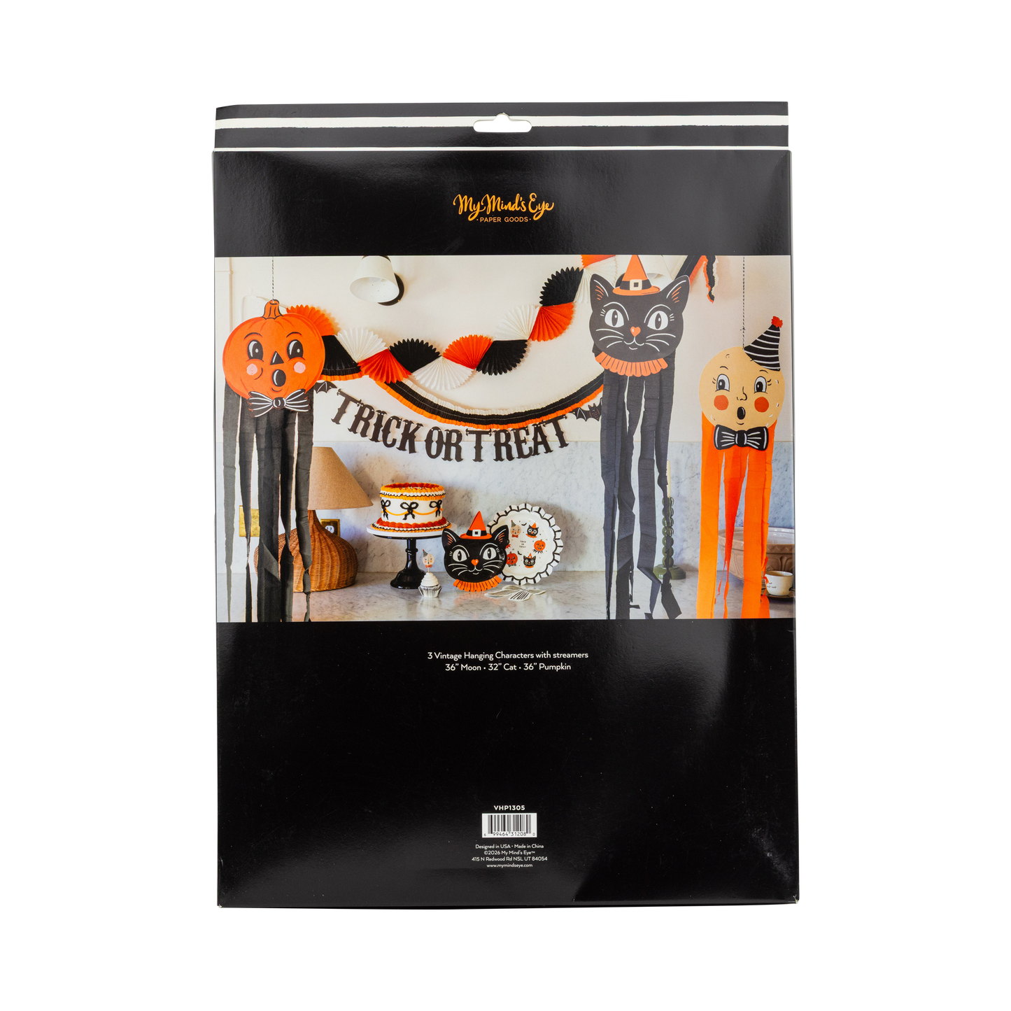 Halloween-themed product packaging with decorative items on a white background