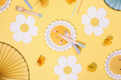 white and yellow daisy shaped napkins