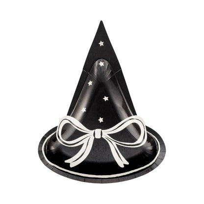 Black witch hat with white stars and a bow on a white background