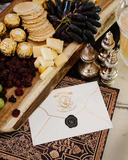 Spellbound envelope napkin styled on a wizard-themed party table