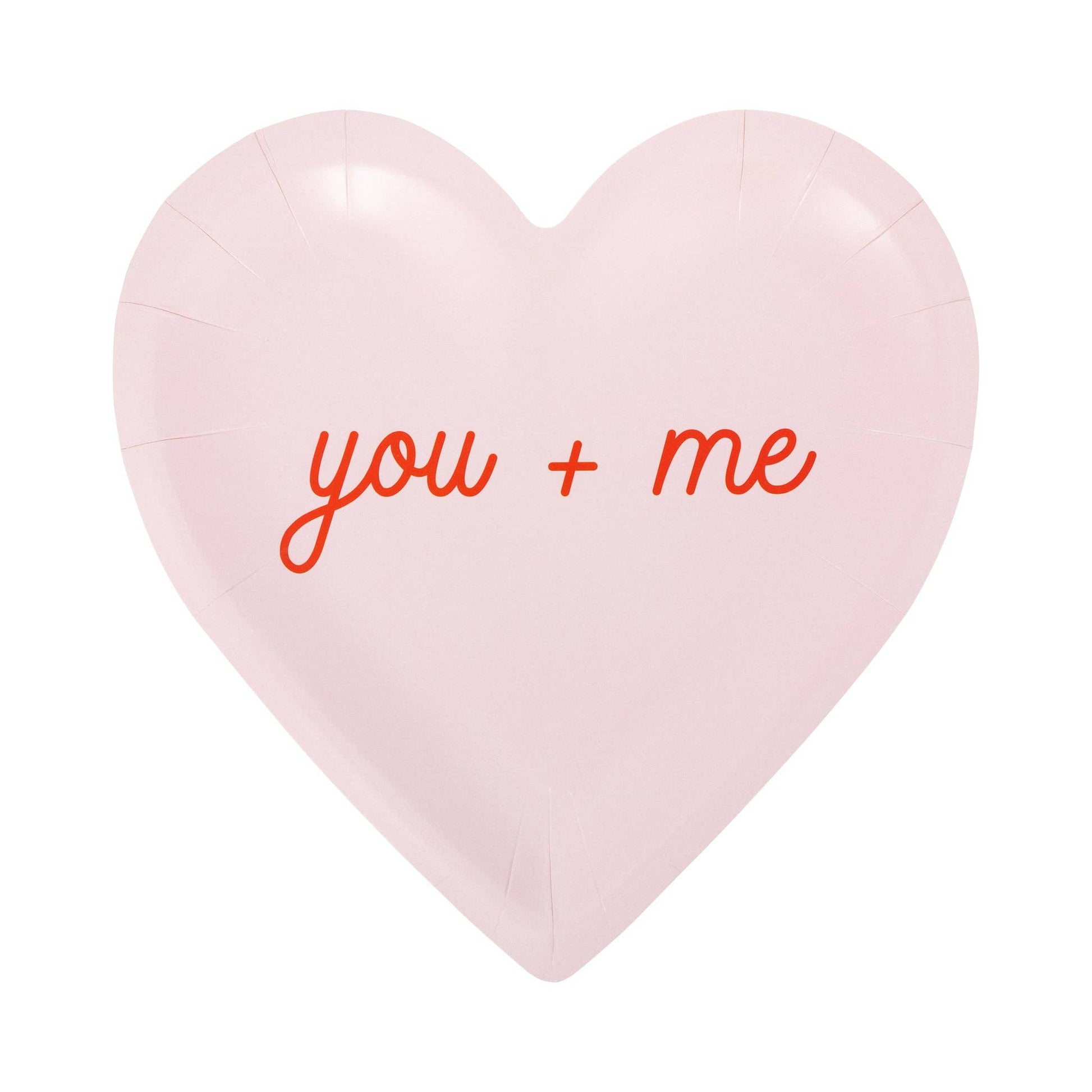 Light pink heart-shaped plate with “you + me” Valentine message, sold in Toronto at Confetti My Party