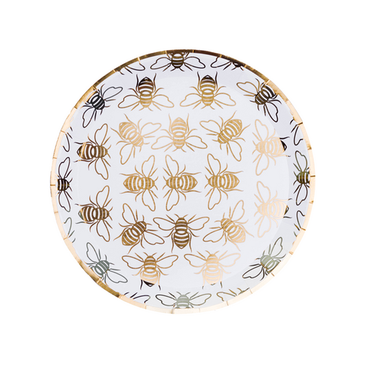 white and gold bee plates