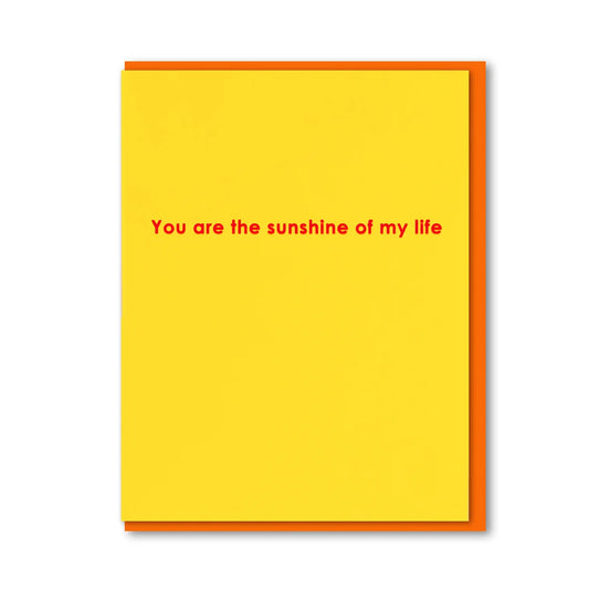 yellow greeting card with red message "you are the sunshine of my life"