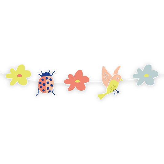paper cut out garland featuring flowers, a lady bug and a bird