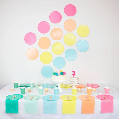 multi-coloured paper plate set up