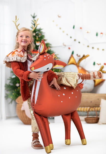 christmas themed decor with deer foil balloon