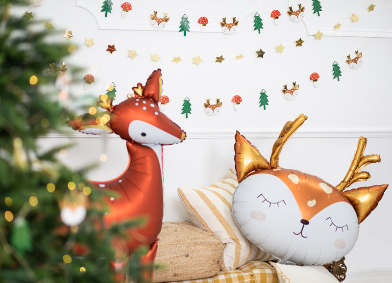 standing deer foil balloon and blushing deer foil balloon with christmas tree
