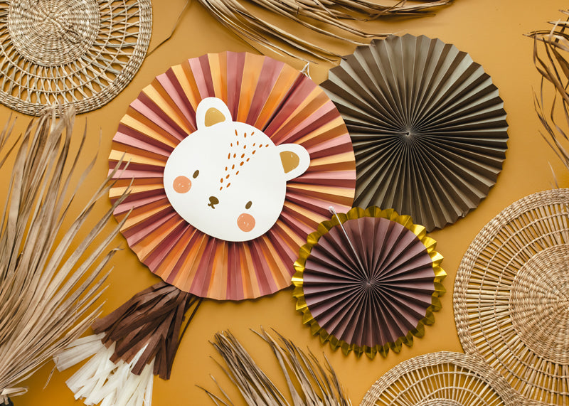 paper fan with lion face and paper tassel