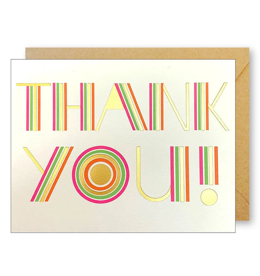 greeting card with neon type face and message "thank you!" on front