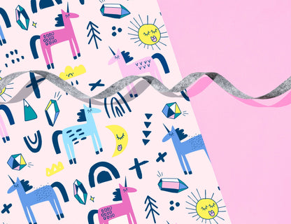 pastel coloured gift wrap with pink and blue unicorns
