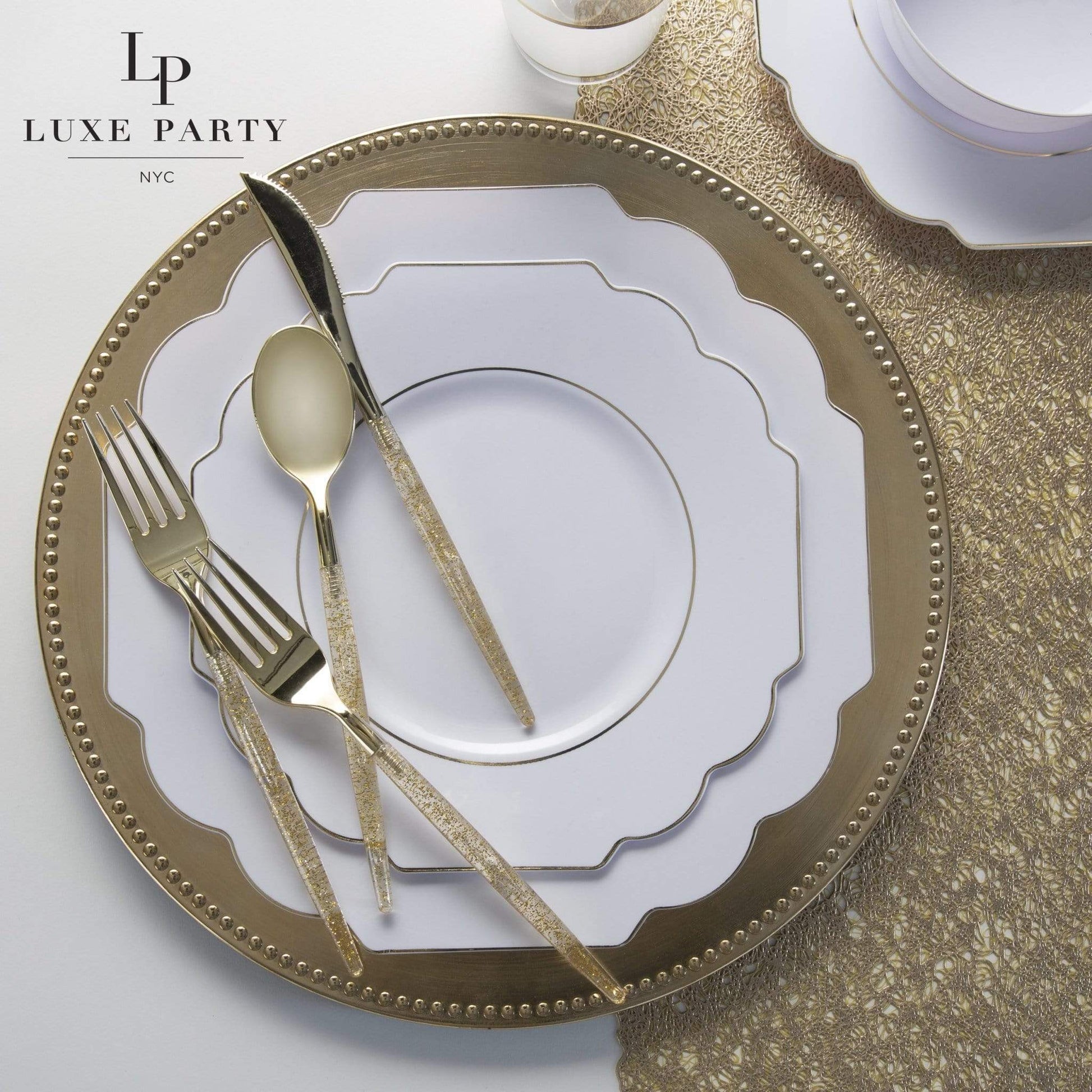 white and gold themed table setting
