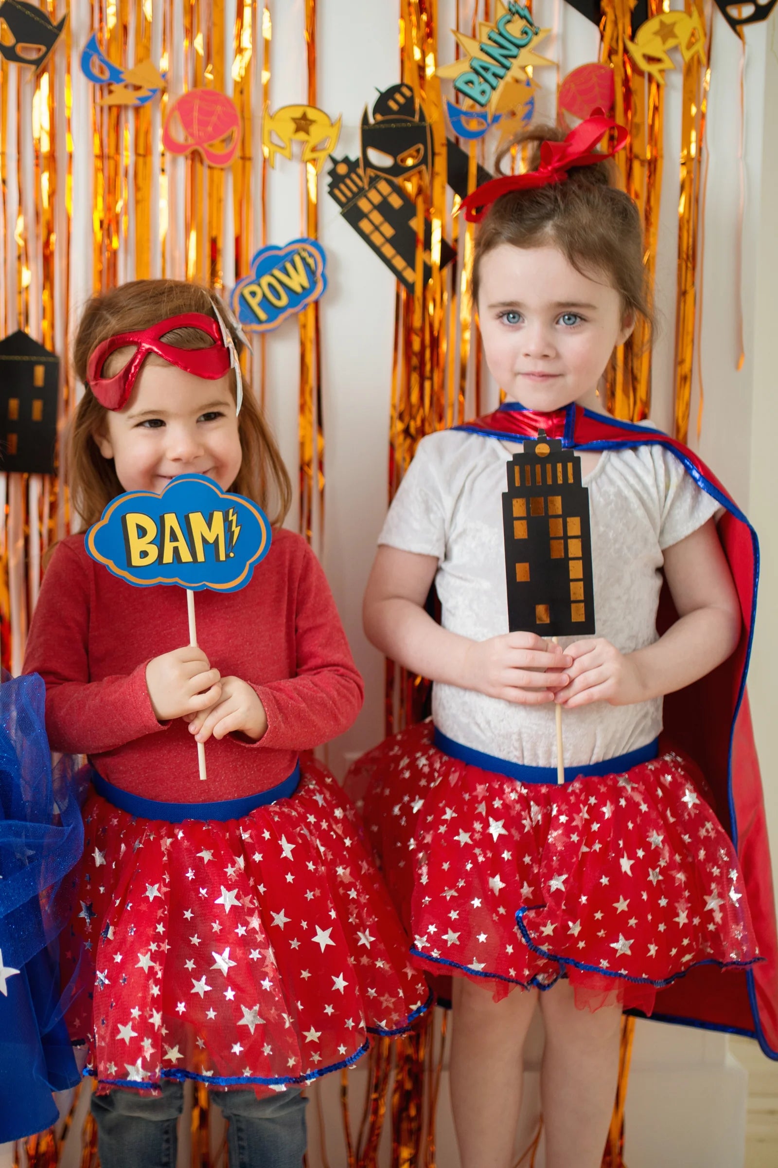 superhero themed party inspo with photo booth props