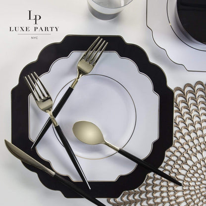 white and gold plastic plates with scalloped edge